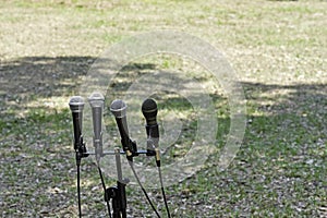 Microphones against grass background