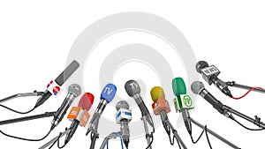 Microphones of different mass media isolated on white. Press conference or interview concept