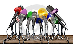 Microphones of different mass media, radio, tv and press for press conference or interview on the wooden table. 3D rendering