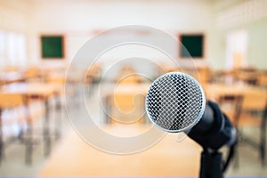 Microphones on voice speaker in classroom at university lecture hall, Concept of speech and teaching with microphone keynote at photo