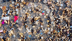 Microplastics found on the shore of a beach in Lanzarote. Sea pollution by plastic photo