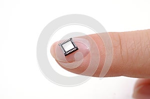 Microprocessor on girls fingertip