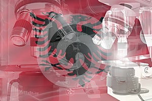 Microscope on Albania flag - science development conceptual background. Research in nanotechnology or clinical medicine, 3D