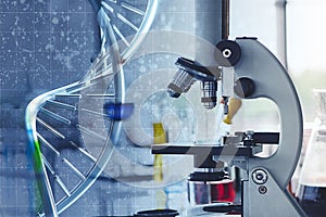 Microscope and DNA in reseach laboratory photo