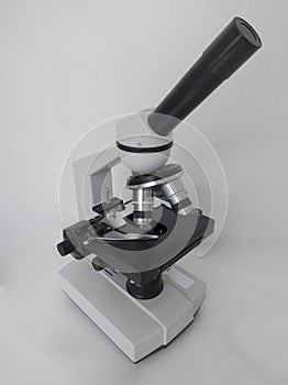 Microscope, examining samples and liquid. technical equipment