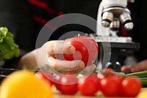 Microscope head on kitchen background
