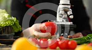 Microscope head on kitchen background