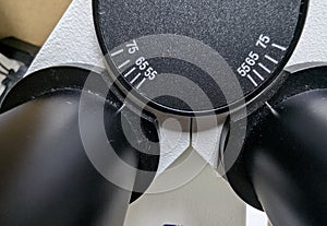 Microscope interpupillary distance adjustment