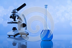 Microscope, Laboratory beakers,Science experiment