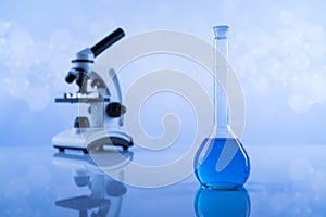Microscope, Laboratory beakers,Science experiment