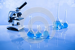 Microscope, Laboratory beakers,Science experiment