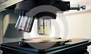 microscope with lens at laboratory