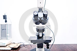 Microscope in medical laboratory. Scientific sample testing and forensic probe simulator