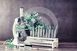 Microscope and test partings on the table in the laboratory