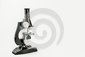 Microscope on white background