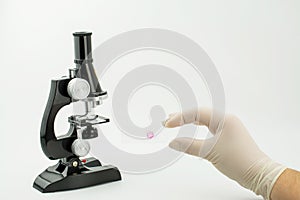 Microscope on white background and  bacteria virus