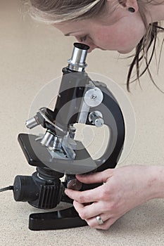 Microscope with woman
