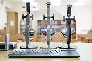 Microscopes on a school desk