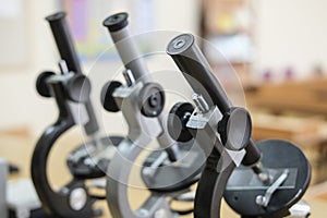 Microscopes on a school desk