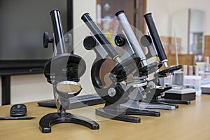 Microscopes on a school desk