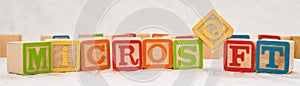 Microsoft phrase written with kids cubes photo