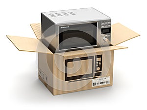 Microwave oven in carton cardboard box. E-commerce, internet online shopping and delivery concept.