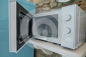 Microwave oven with opened door