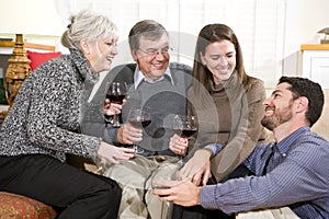 Mid-adult and senior couples enjoying conversation