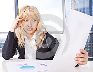 Mid adult woman work with documents photo