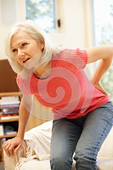 Mid age woman with backache