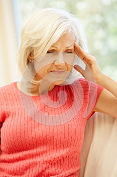 Mid age woman with headache