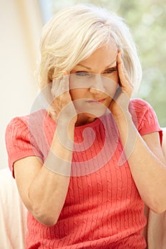 Mid age woman with headache