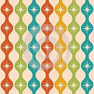 Mid century modern atomic starbursts over colorful ogee ovals seamless pattern in green, teal, orange and mustard yellow.