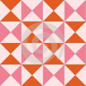 Mid century modern pink and orange triangles seamless pattern.