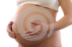 Mid section closeup of a pregnant woman