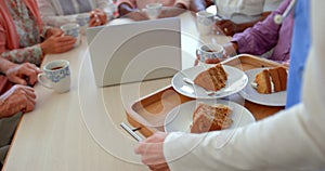 Mid section of female nurse holding breakfast tray at nursing home 4k