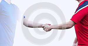 Mid section of two sportsmen shaking hands against white technology background