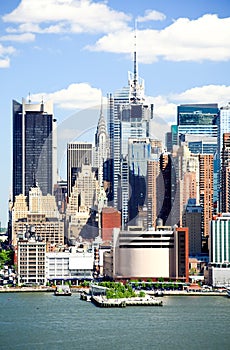 The Mid-town Manhattan Skyline on a sunny day