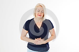 Middel age Woman holding her stomach with her hands, blonde woman with stomach ache pain isolated, female with stomach issues