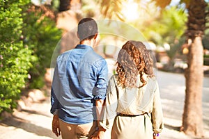 Middle age beautiful couple smiling happy and confident at town park