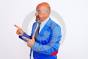 Middle age businessman wearing suit standing over isolated white background Thinking worried about a question, concerned and