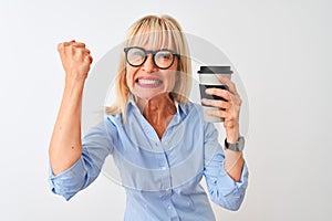 Middle age businesswoman wearing glasses drinking coffee over isolated white background annoyed and frustrated shouting with