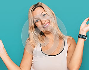 Middle age caucasian woman wearing casual clothes dancing happy and cheerful, smiling moving casual and confident listening to