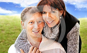 Middle-age couple embraced outdoor photo