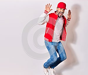 Middle age handsome man wearing baseball uniform smiling happy