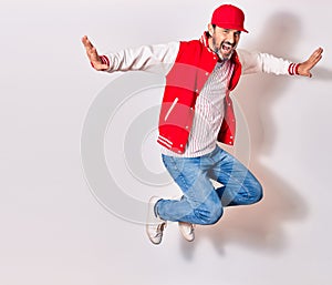 Middle age handsome man wearing baseball uniform smiling happy