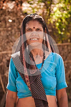 Middle age indian villager woman smiling photo