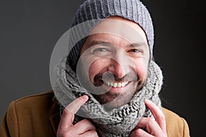 Middle age man with hat and scarf