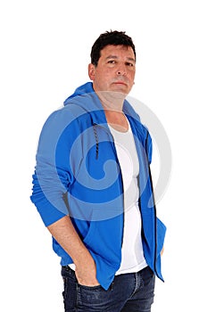 Middle age man standing in blue hoody