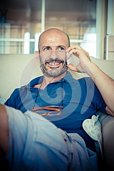 Middle age man using phone